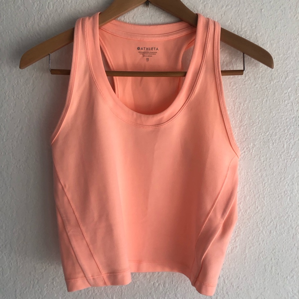 Athleta neon peach crapped wicking cropped top